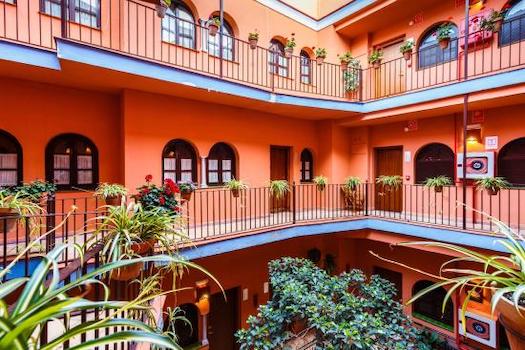 seville hotel hebergement patio fleur andalousie espagne monplanvoyage