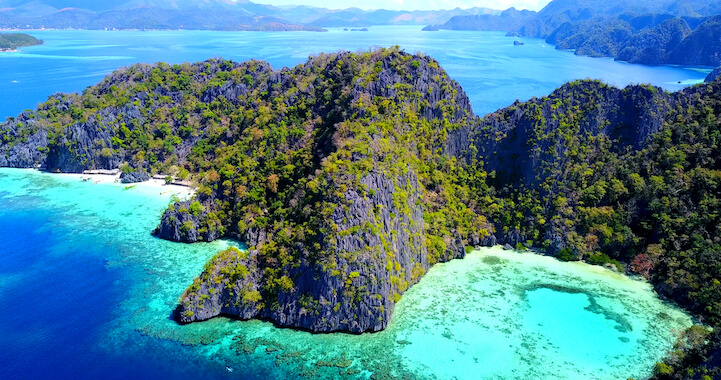 palawan ile plage sable blanc eau turquoise bateau philippines archipel monplanvoyage